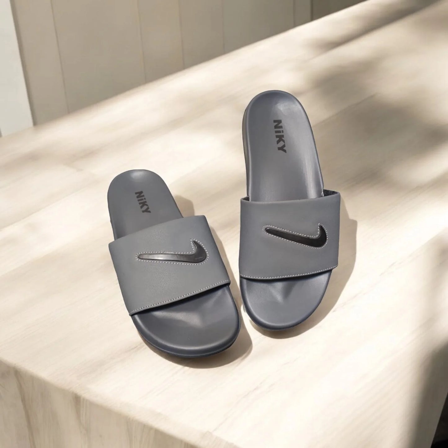 NIKY SLIPPER GRAY